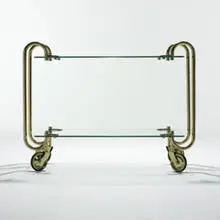 teacart by Fontana Arte, c. 1960, brass, Securit tempered glass, rubber, sold Mar 2007