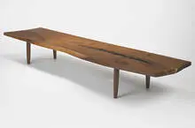 Plank bench by George Nakashima, 1955, American black walnut, laurel, sold Mar 2007