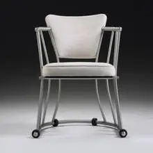 armchair, model #1045-A by Warren McArthur, c. 1930, aluminum, upholstery, rubber, sold Mar 2007