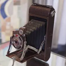 No. 1A Gift Camera by Walter Dorwin Teague, c. 1930, enameled metal and lacquered cedar box, Kodak camera with applied decoration, sold Mar 2007