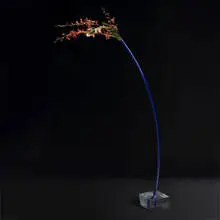Ephemera vase by Shiro Kuramata, 1989, acrylic, anodized aluminum, sold Mar 2007