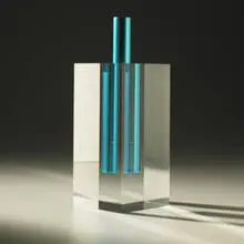 small vase by Shiro Kuramata, 1989, anodized aluminum, acrylic, sold Mar 2007