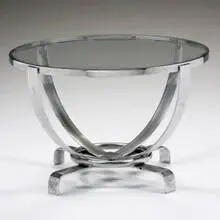coffee table by Donald Deskey, c. 1930, chrome-plated steel, glass, sold Mar 2007