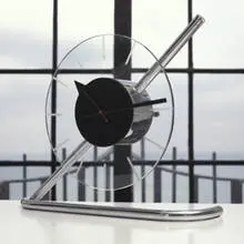 Gilbert Rohde, Z-clock, 1933, chrome-plated brass, glass, enameled metal