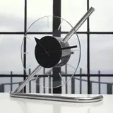Gilbert Rohde, Z-clock, 1933, chrome-plated brass, glass, enameled metal