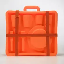 PIC-NIC set by Marc Newson, 2003, molded rubber, fabric, porcelain, sold Mar 2007
