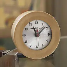 Gilbert Rohde, table clock, c. 1935, walnut, lacquered wood, glass, enameled metal