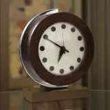 Gilbert Rohde, table clock from the 1933-34 World's Fair, model #4084B, 1934, walnut burl, ash, enameled metal, chrome-plated steel