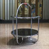 Wolfgang Hoffmann, occasional table, c. 1930, nickel-plated steel, laminate, Bakelite