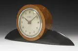attribution Gilbert Rohde, table clock, c. 1945, burled maple, lacquered wood, glass