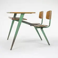 school desk by Jean Prouvé, c. 1950, enameled steel, oak, sold Mar 2007