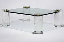 coffee table by Karl Springer, c. 1975, glass, acrylic, brass, sold Mar 2007