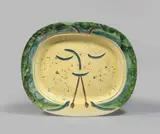 Joueur de diaule by Pablo Picasso, 1947, Ovale Platte, weißer Ton, mit Engobenbemalung, graviert und glasiert; ceramic, Madoura edition, sold Jun 2017