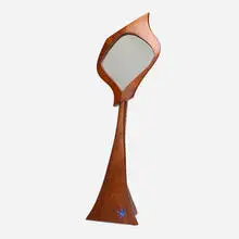 tabletop mirror by Robert Whitley, c. 1965, carved and painted walnut, mirrored glass, sold Jul 2020