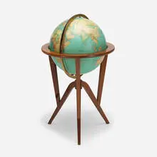 Cosmopolitan Globe by Edward Wormley, 1953, walnut, brass, printed paper over plastic, sold Jul 2020