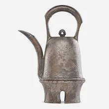teapot on stand by Anne Hirondelle, c. 1990, glazed stoneware, sold Jul 2020