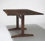 Trestle dining table by George Nakashima, c. 1960, American black walnut, rosewood, sold Oct 2006