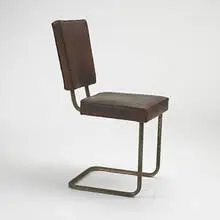 William Lescaze, chair, c. 1930, brass-plated steel, leather