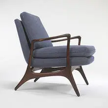 lounge chair by Vladimir Kagan, c. 1957, walnut, upholstery, sold Oct 2006
