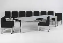 Paul Evans, dining table and ten chairs, 1974, chrome-plated steel, upholstery