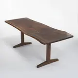 Trestle dining table by George Nakashima, c. 1960, American black walnut, rosewood, sold Oct 2006