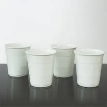 Charles Turzak, ceramic cups, set of four, 2003, porcelain