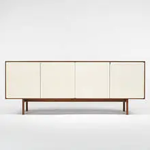 Florence Knoll, credenza, c. 1960, walnut, lacquered wood, stainless steel