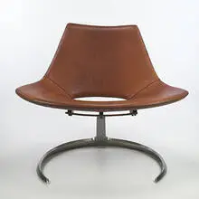 Stanton Macdonald-Wright, Scimitar lounge chair, 1962, stainless steel, leather
