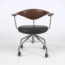 Swivel chair, model #50 by Hans J. Wegner, 1955, teak, leather, enameled steel, sold Oct 2006