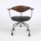 Hans J. Wegner, Swivel chair, model #50, 1955, teak, leather, enameled steel