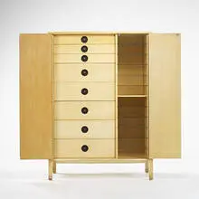 cabinet by Harvey Probber, c. 1950, bleached mahogany, bleached walnut, lacquered wood, brass, glass, sold Oct 2006