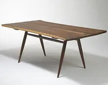 dining table by George Nakashima, c. 1951, American black walnut, rosewood, sold Mar 2006