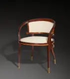 Josef Hoffmann, Armlehnstuhl – aus der Einrichtung des Speisezimmers der Dritten Winterausstellung, 1899, Mahagoni, Messingfußmanschetten. 77 cm (30 ⅜ in.)