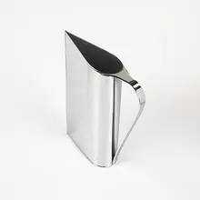 Normandie pitcher by Peter Müller-Munk, 1935, chrome-plated brass, sold Mar 2006