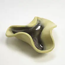 Manta Ray bowl by Russel Wright, c. 1945, glazed stoneware, sold Mar 2006