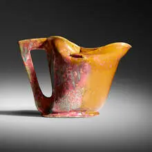 Exceptional pitcher by George E. Ohr, 1897-1900, glazed earthenware, sold Jun 2020