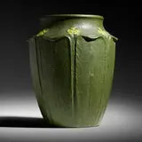Rare vase with cinquefoils by Marie Seaman for Grueby Faience Company, c. 1905, glazed earthenware, sold Jun 2020