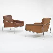 lounge chairs model #3300, pair by Arne Jacobsen, c. 1956, leather, stainless steel, sold Mar 2006