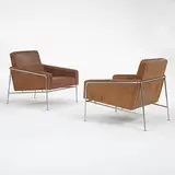 lounge chairs model #3300, pair by Arne Jacobsen, c. 1956, leather, stainless steel, sold Mar 2006