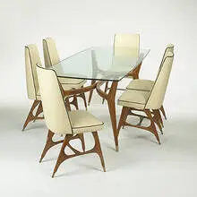 dining set by attribution Carlo de Carli, c. 1950, Italian walnut, brass, glass, vinyl, sold Mar 2006