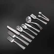 Allan Adler, Starlit flatware, 1952, hand-hammered silver