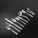 Allan Adler, Starlit flatware, 1952, hand-hammered silver