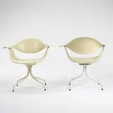 Swaged-Leg armchairs, pair by George Nelson & Associates, 1958, fiberglass, enameled metal, rubber, sold Mar 2006