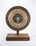 Stan Bitters, Freestanding medallion sculpture, Glazed ceramic relief mounted on weatherproof backing with a flat plastered panel on back mounted to a welded steel base with a rust finish, giving the appearance of a floating sculpture