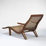 Edward Wormley, chaise lounge, c. 1956, walnut, cane, upholstery