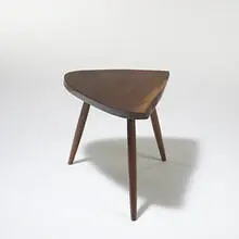 Plank side table by George Nakashima, c. 1945, American black walnut, sold Mar 2006
