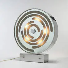 Sunlight table lamp by Innocente Gandini, c. 1970, chrome-plated steel, mirrored glass, frosted glass, sold Mar 2006