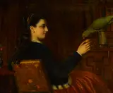 John Edgar Williams, A young lady seated in profile feeding a parrot, oil on canvas