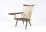 Lounge chair with one arm by George Nakashima, c. 1958; this example executed 2003 at the Studio by Mira Nakashima, sold Dec 2008