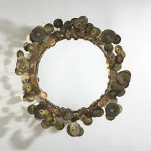 mirror by C. Jeré, c. 1970, brass, copper, mirrored glass, sold Mar 2006